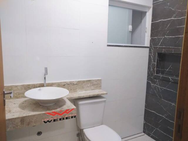 Casa à venda com 3 quartos, 99m² - Foto 11