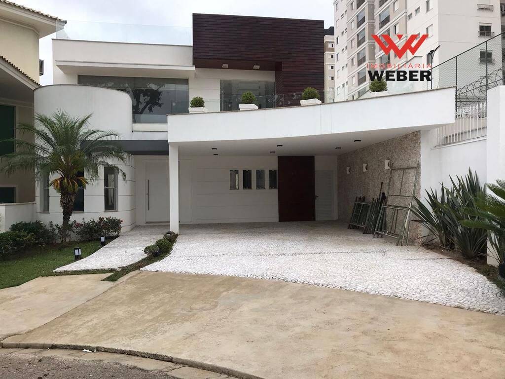 Casa à venda e aluguel com 4 quartos, 366m² - Foto 1