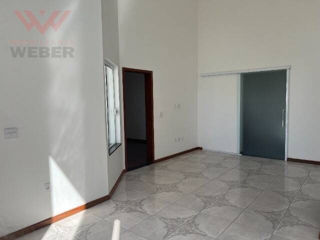 Casa de Condomínio para alugar com 3 quartos, 150m² - Foto 4